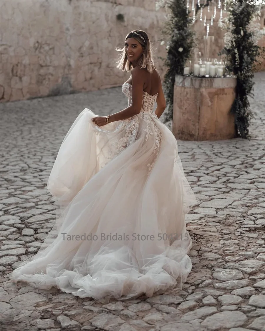 Customized Breathtaking Strapless Wedding Dress Featuring Stunning Crystals Lace Appliques and Flowy Silhouette Bridal Dress