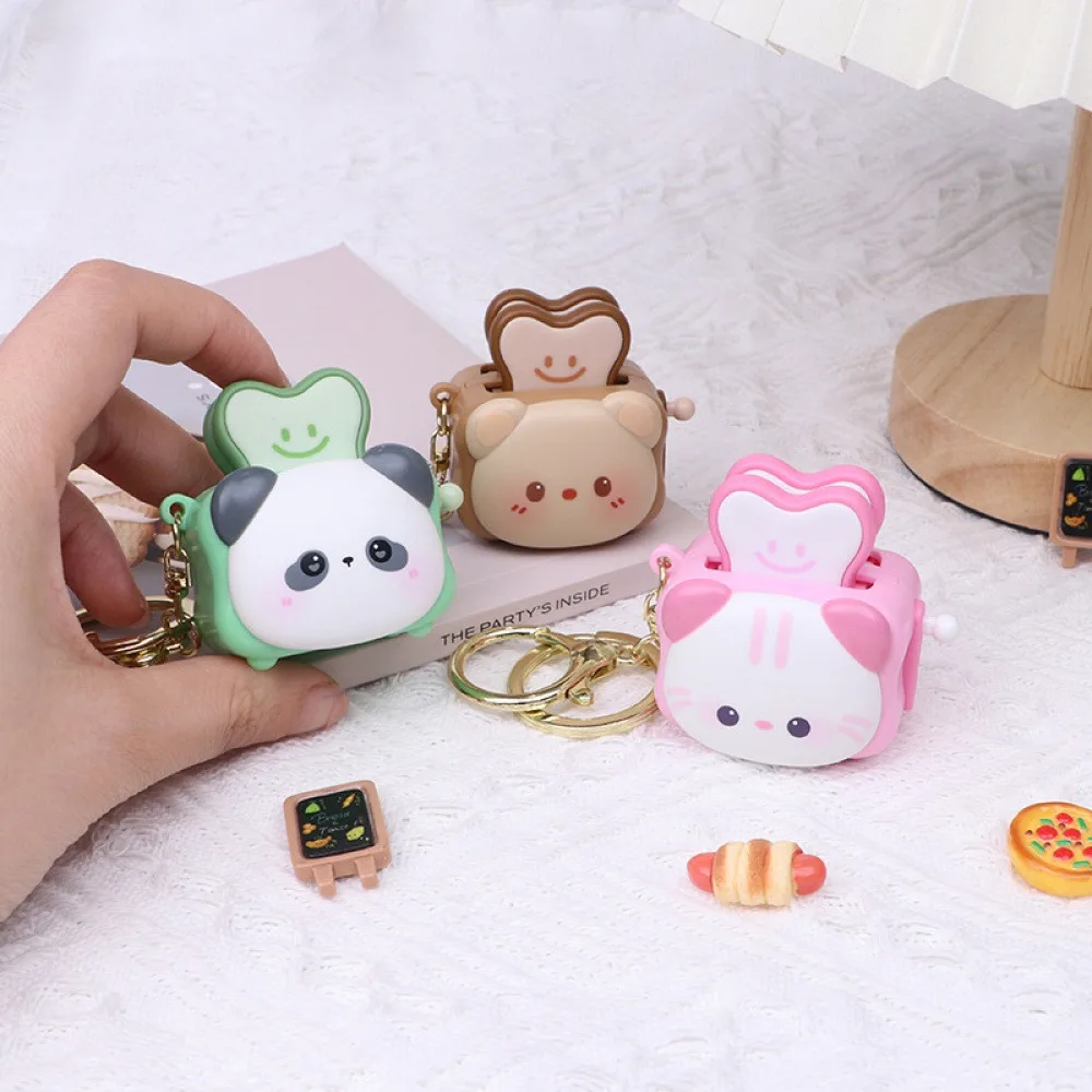 Divertido colgante de tostadora con forma de animal de dibujos animados, decoración para mochila de estudiante, llavero antiestrés con forma de tostadora, accesorio para bolso