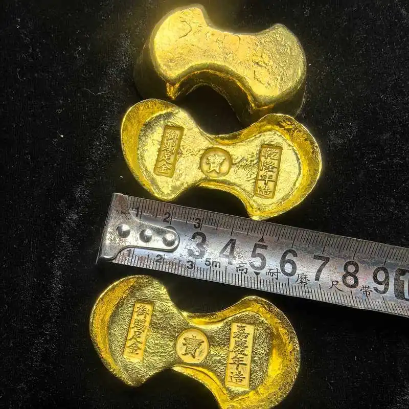 Gilded ingots, cakes, , gold bars, tea ceremony and film props
