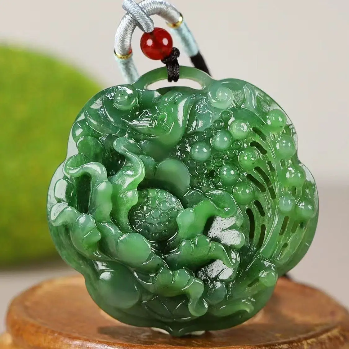 Natural Xinjiang Hetian jade jasper hollow flower blooming rich carved pendant 55mm