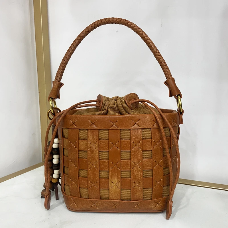 mini-borse-a-secchiello-vintage-per-le-donne-borse-e-portamonete-di-design-di-lusso-2025-novita-in-pu-con-ciondolo-in-rilievo-con-manico-superiore-cavo