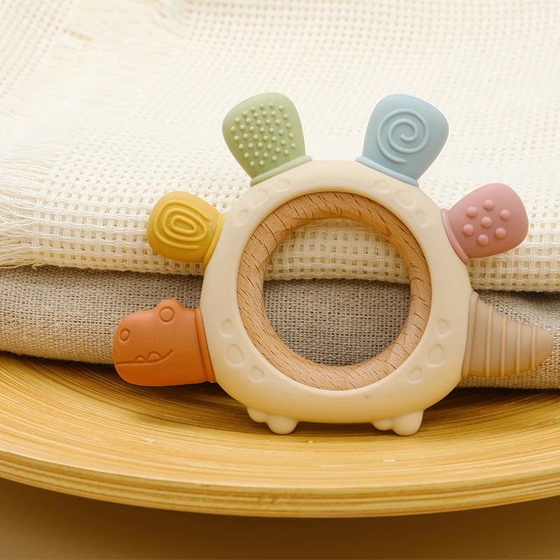 الكرتون ستيجوسورس الطفل حلقة خشبية سيليكون ألعاب التسنين سهلة الإمساك هدية الوليد BPA الحرة الملونة الرضع مضغ لعبة المولي