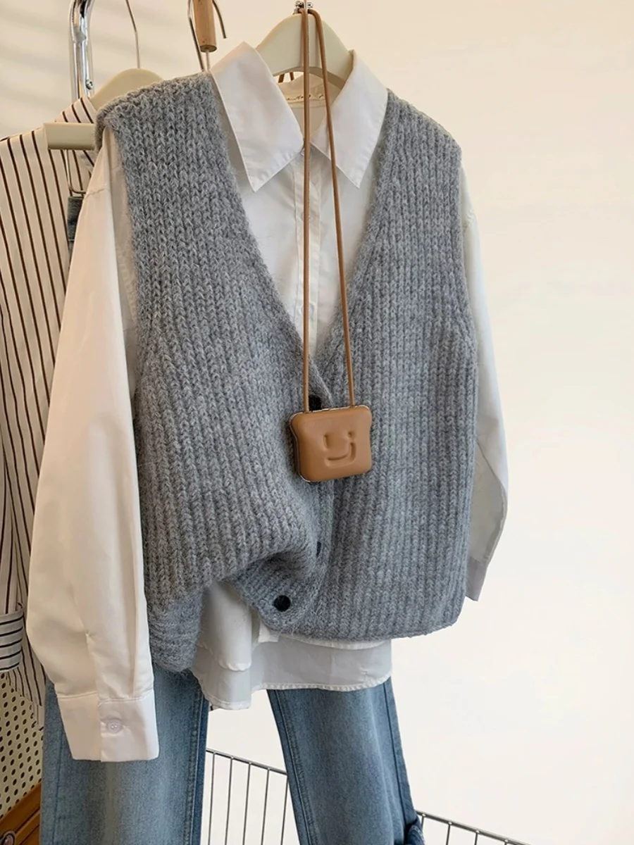 Sweter bez rękawów z dzianiny w kształcie litery V, damski, jesienno-zimowy, uniwersalny, swobodny kardigan, modna odzież wierzchnia do noszenia warstwowo.