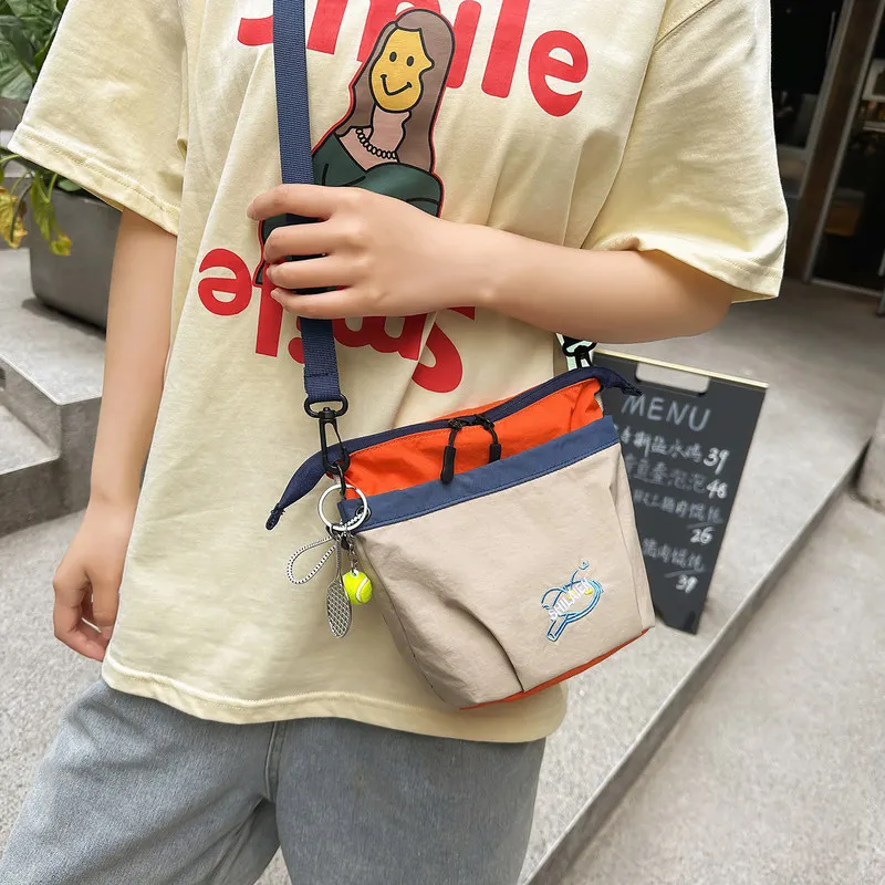 Two-tone crossbody bag for men and women, outdoor sports shoulder bag, multifunctional commuter bag, portable travel dopamine ph