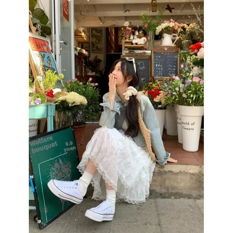 صيف جديد المرأة فستان بحزام عطلة الشاطئ نمط كعكة تنورة فستان شاطئ طويل تصميم الإحساس بلا أكمام مرونة الخصر #4