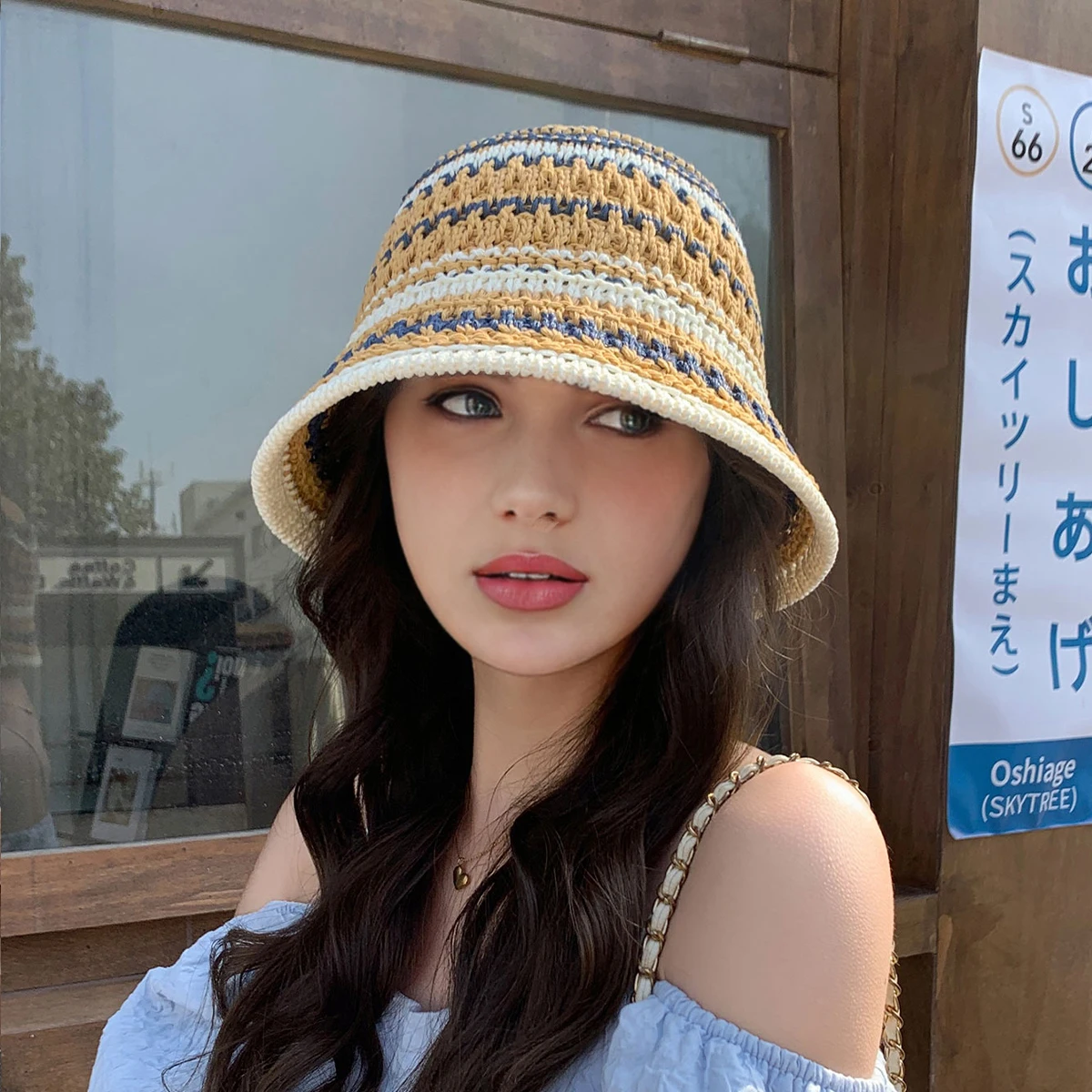 1 women's colorful striped knitted hollow hat that can be folded for outdoor travel and sun protection