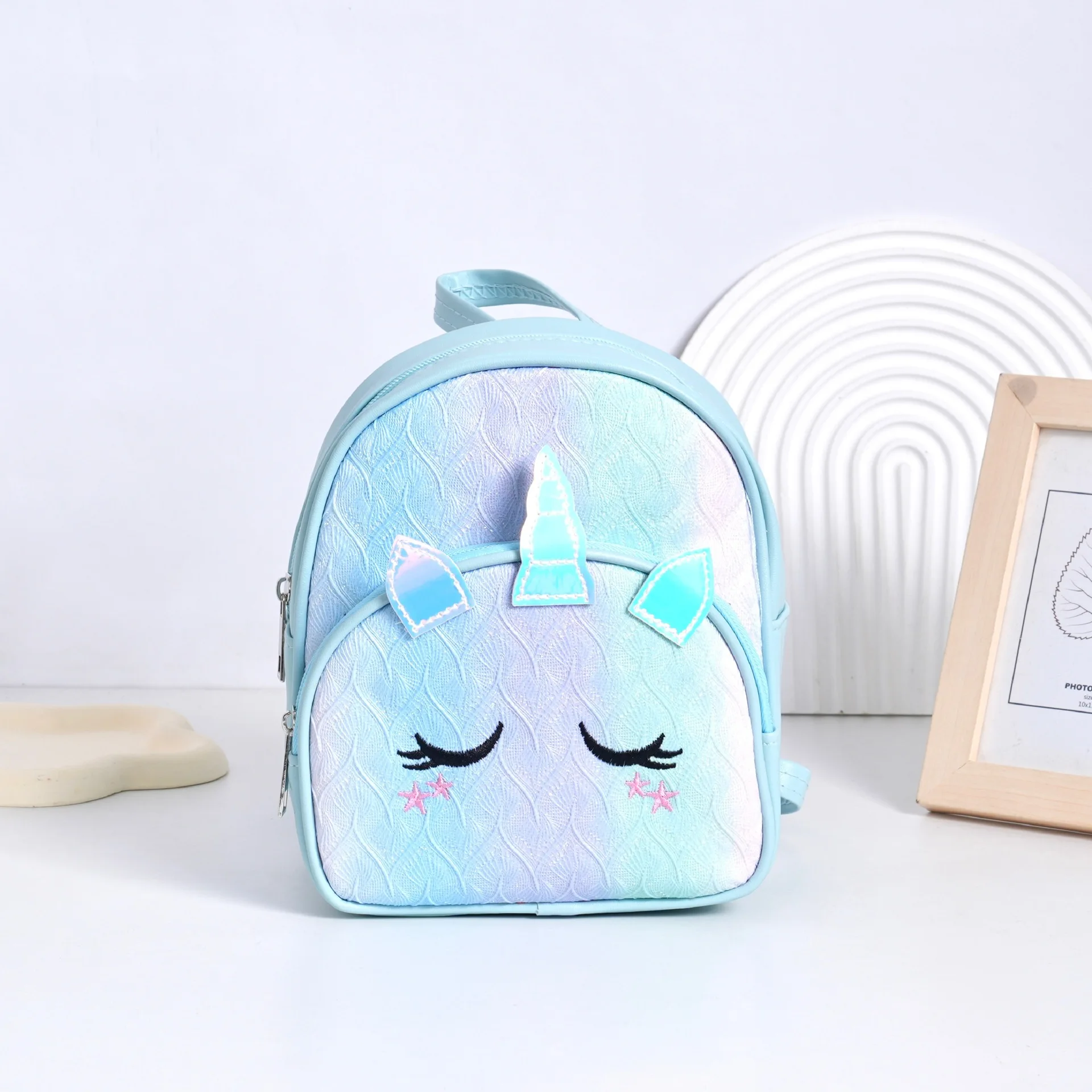 Mochila escolar bordada con pestañas, bolso de un solo hombro, personalizado, unicornio de dibujos animados, teñido con lazo láser, nueva moda