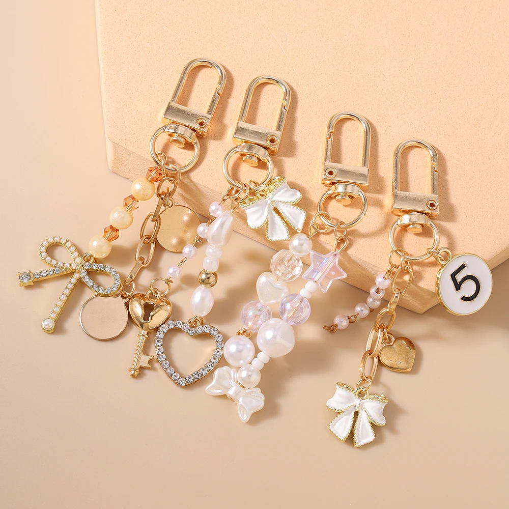 Aihua Niedlicher Y2K Metall-Schleifenherz-Schlüsselanhänger mit Perle für Damen und Mädchen, Handtaschenanhänger, DIY Handgemachter Schmuckzubehör – Detail 5