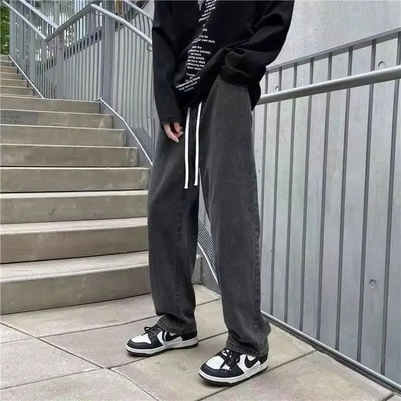กางเกงยีนส์ผู้ชายลำลองกลางแจ้งเอวยางยืดทรงหลวมกางเกงขายาวฤดูใบไม้ผลิฤดูใบไม้ร่วงชุดทำงานสบายขาตรงผ้ายีนส์สีน้ำเงิน