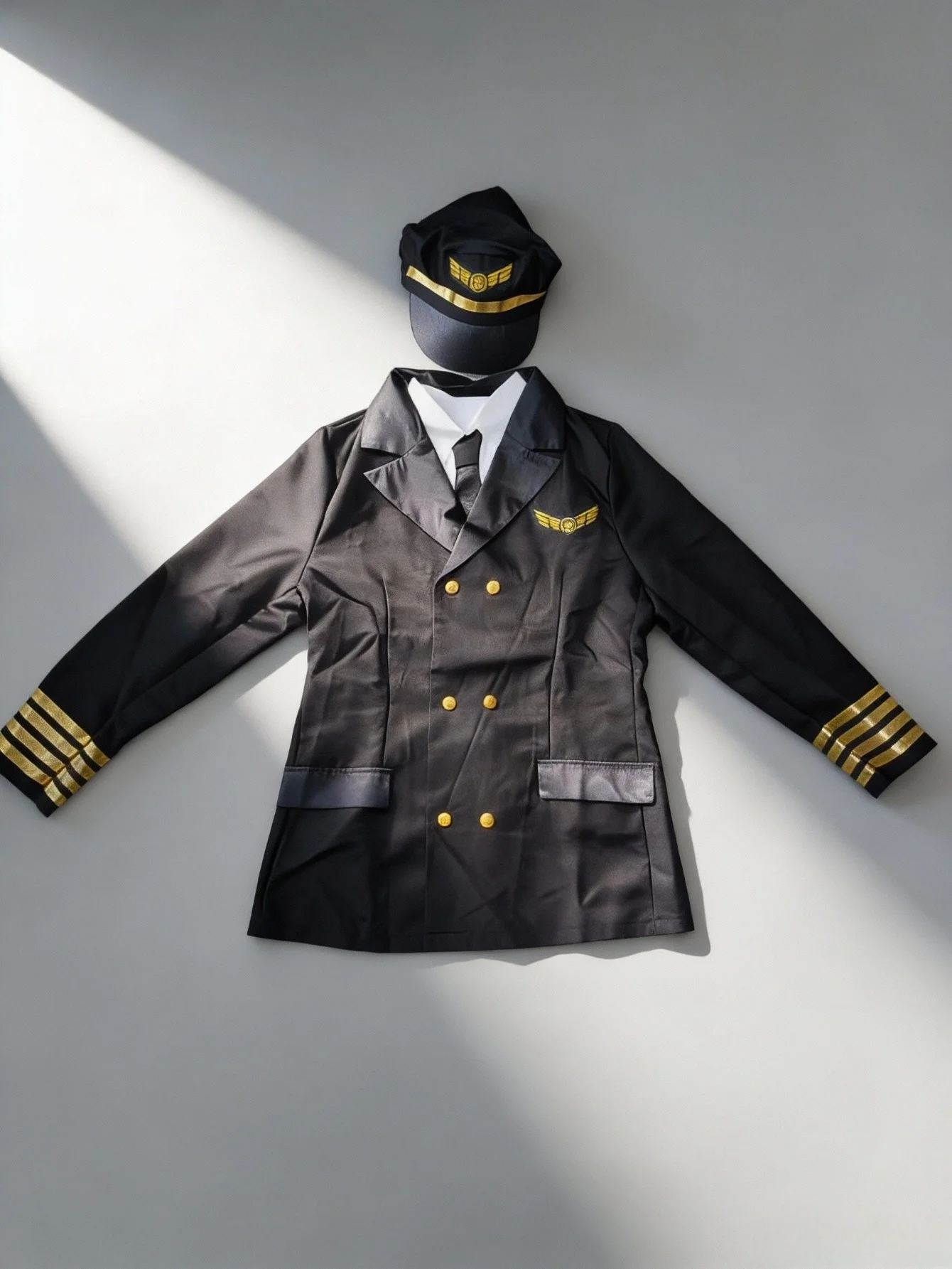 A Set of Children's Captain Uniform Role-Play Costumes, Including One Jacket + One Top + One Hat. The Classic Black Double-Breasted Design of the Jacket Is Perfect for Professional Events, Halloween Parties, Children's Stage Performances, and School Role-Playing Days. view 5