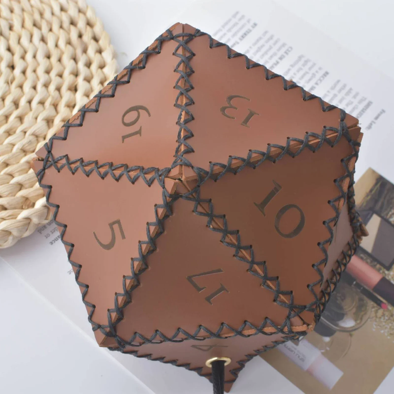 Stylish and Functional Brown Drawstring Pouch for RPG Games Designed to Hold Multiple Types of Polyhedral Dice