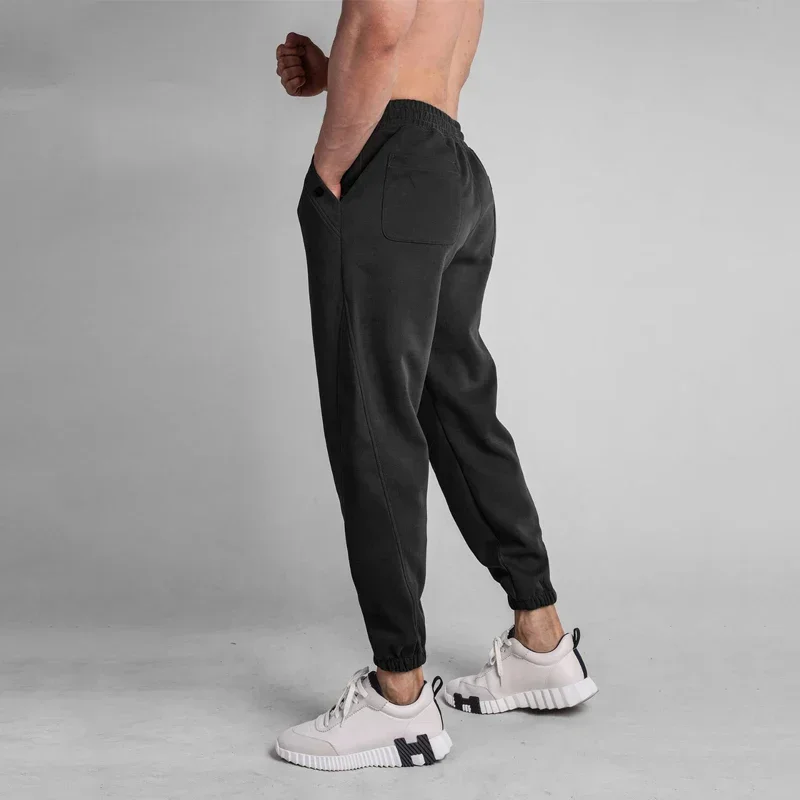 الرجال الرياضة سراويل للجري اللياقة البدنية Sweatpants رجل سروال التدريب رياضة عداء ببطء القطن Trackpants كروسفيت السراويل الذكور الصالة الرياضية الملابس