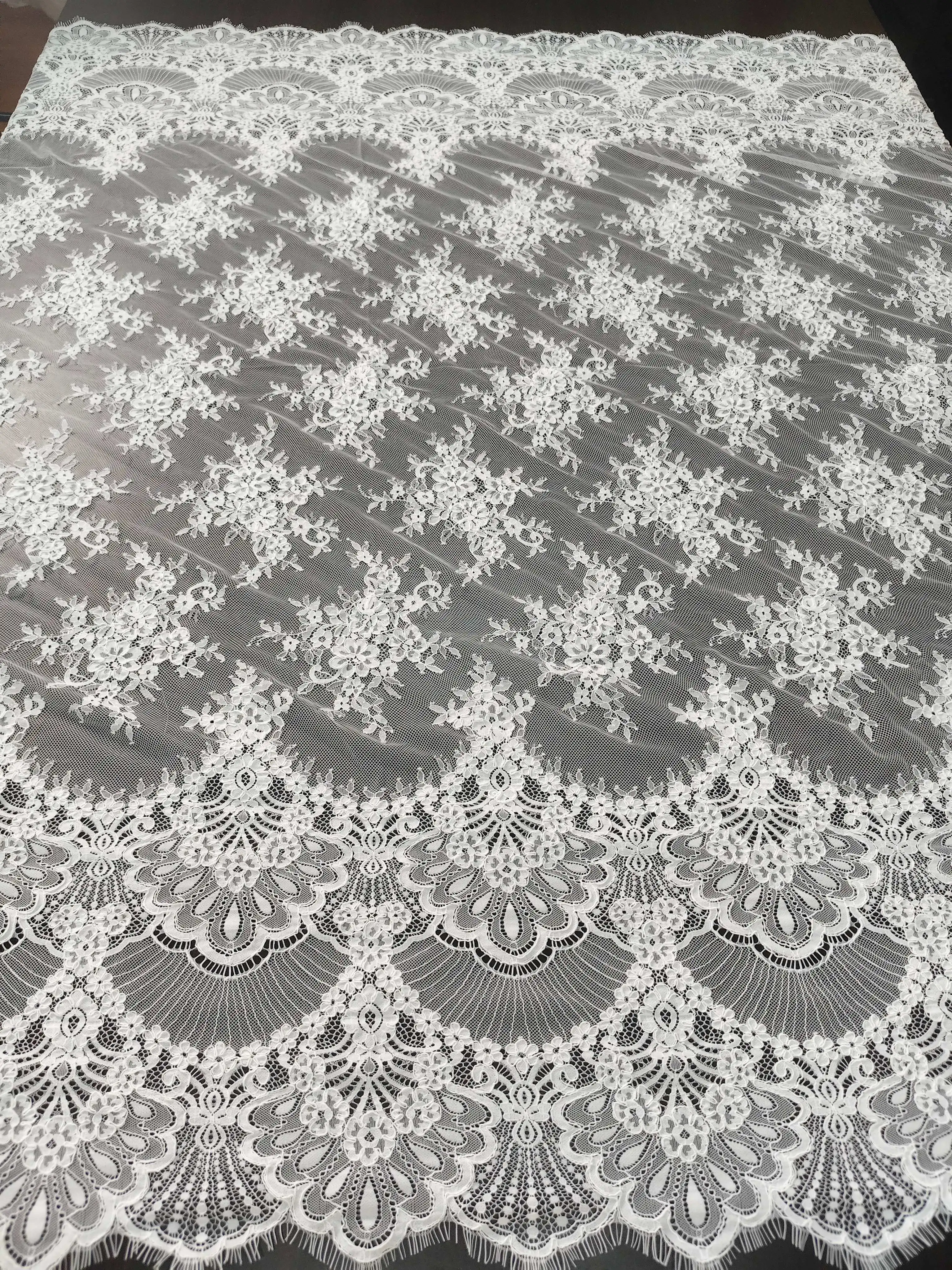 high-quality-ivory-lace-fabric-with-floral-rope-embroidery-and-eyelash-fringe-for-wedding-dresses-and-garment-embellishments