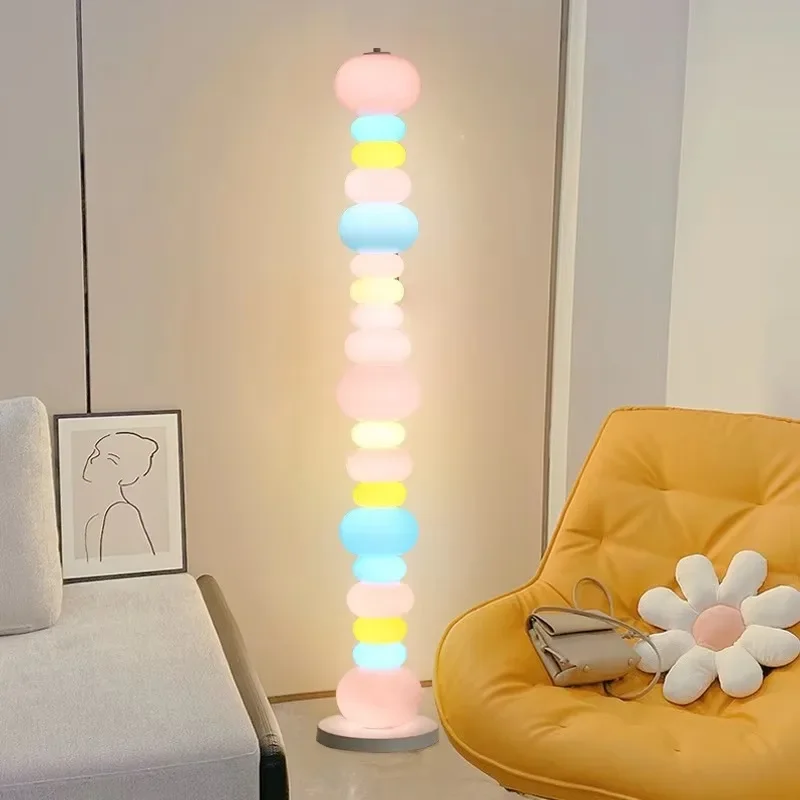 Candy rainbow floor lamp next to bedroom sofa Cream creative floor lamp