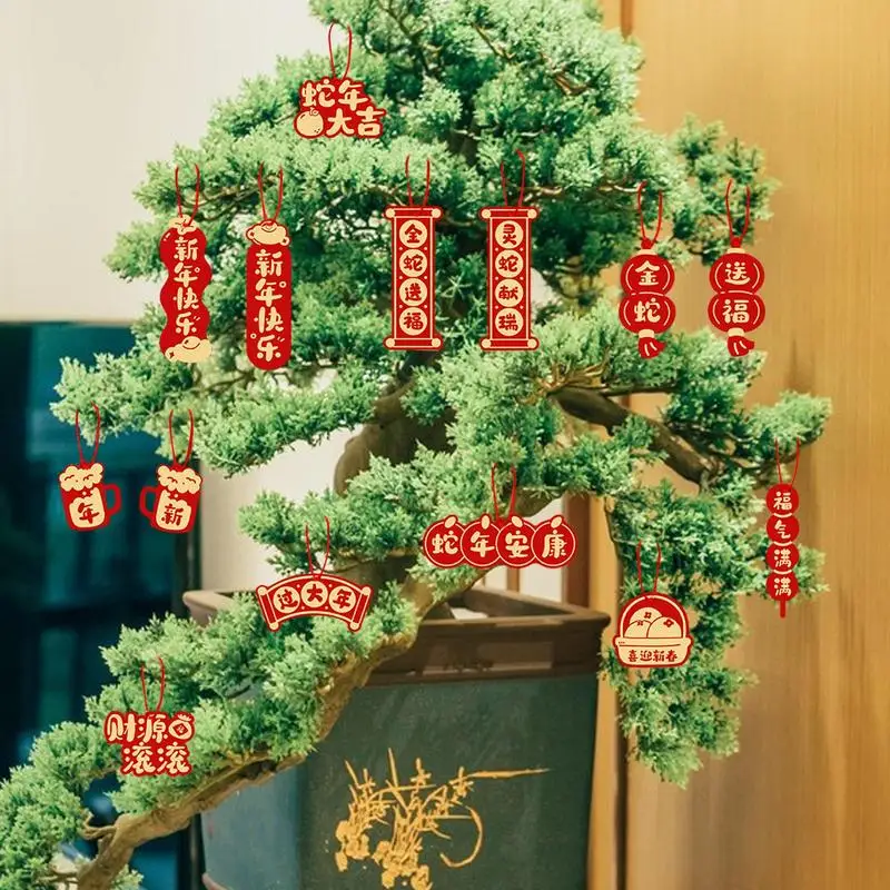 مجموعة زينة السنة الصينية الجديدة 16X قلادة على شكل ثعبان صيني تقليدي لاكي فو زينة السنة الجديدة قلادة ورقية باللون الأخضر