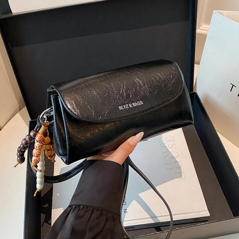 

Богемная женская сумка через плечо из бисера с художественными деталями ручной работы на кожаной основе