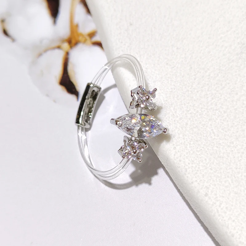 Sweet cute female fashion temperament flowers ladies invisible ring with micro inlaid zirconia transparent fishing line ring