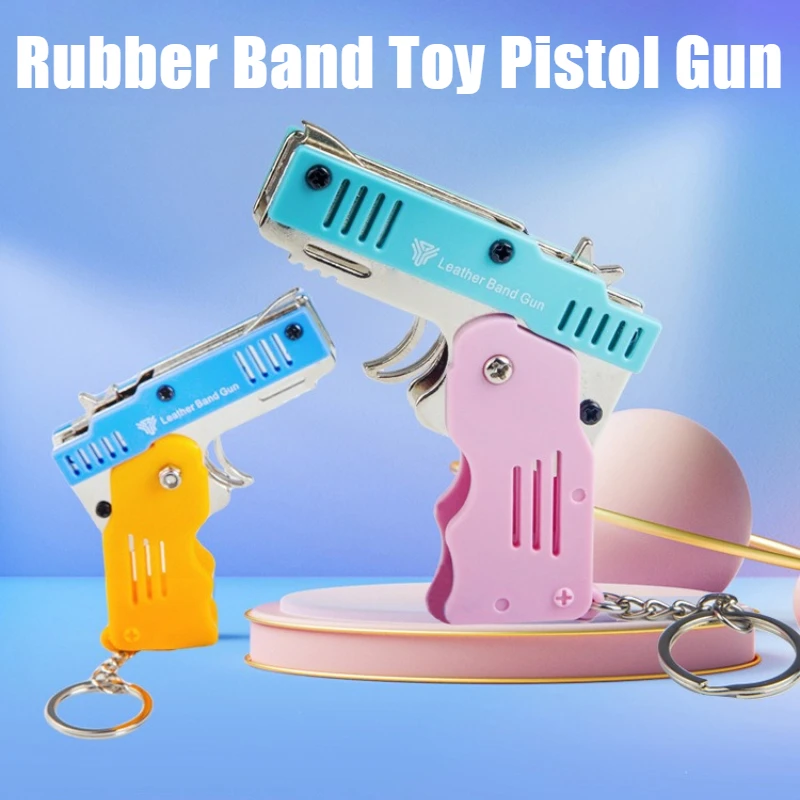 

Alloy Rubber Band Pistol Mini Pendant Foldable Firing Rubber Band 6-shot Children's Toys Soft Bullets Gun Figurines & Miniatures