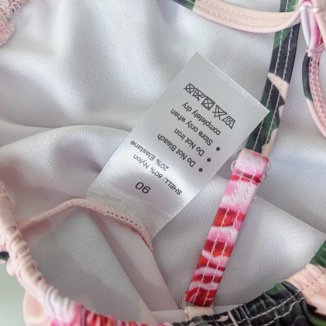 2025 nieuwe roze meisjesbadpak meisjes bikinizwempak met bloemenprint uit één stuk sling-badpak kwaliteit kinderzwemkleding