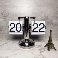 European automatic page turning clock retro simple home living room clock small balance mechanical page turning clock