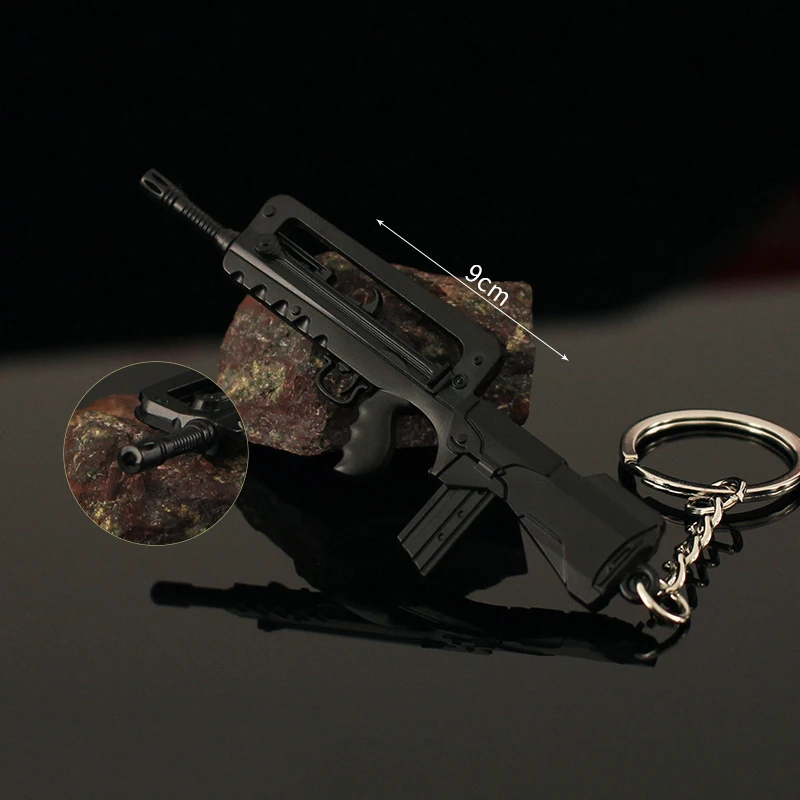 9cm Mini Gun Model FAMAS Keychain Model Jewelry Weapon Metal Pendant Key Chain Chaveiro Bag Car Key Holders Gift For Kids Men