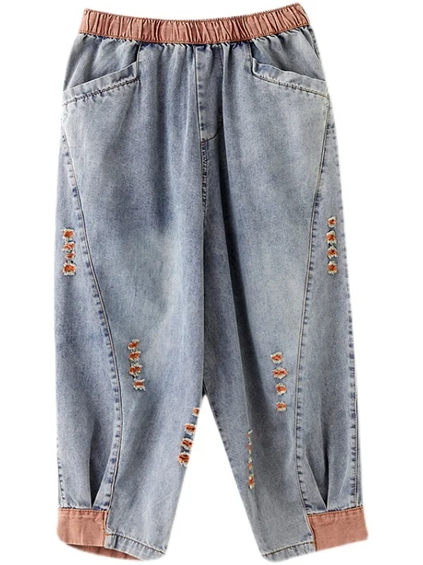 กางเกงยีนส์เอวสม็อคผู้หญิง ไซส์ใหญ่ สำหรับฤดูร้อน แบบเจาะรู สไตล์ลำลอง ฮาราจูกุ ทรงเจ็ดฟุต ช่วยให้ดูผอม