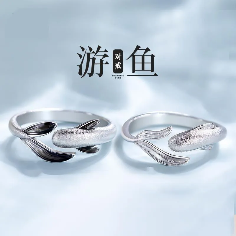 The whale shaped sterling silver couple ring with adjustable opening design is a romantic commemorative gift for couples