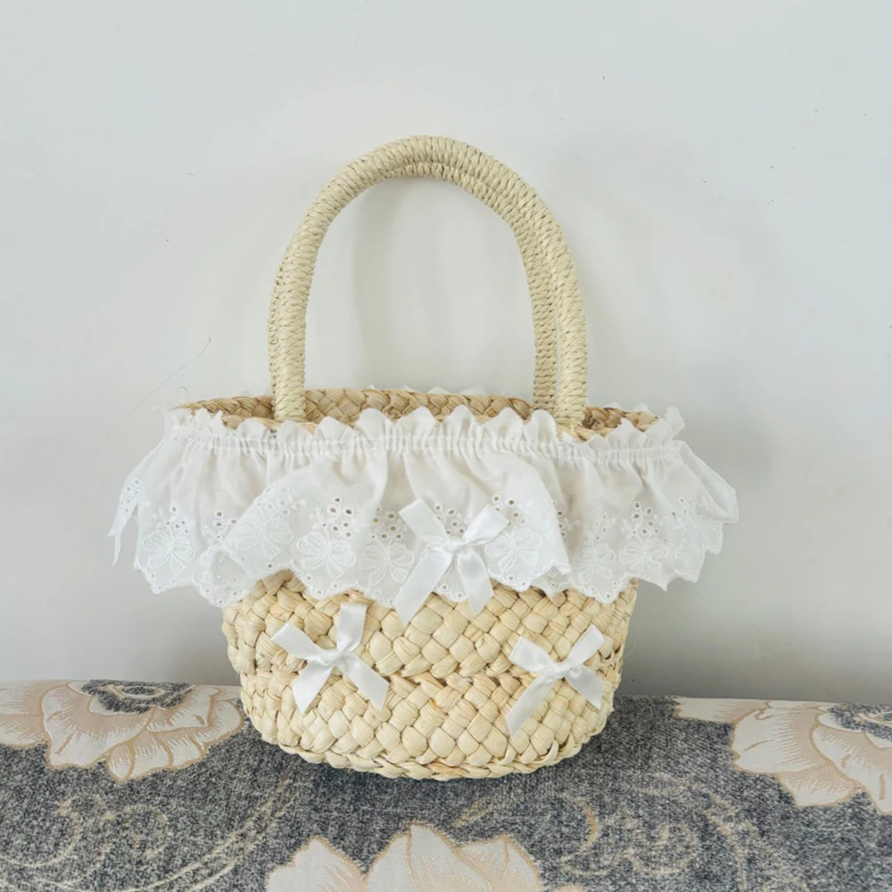 Niedliche Mini-Schleifen-Stroh-Eimertaschen für Frauen, Sommer-Spitzen-Strohtasche, handgefertigte gewebte Handtaschen und Geldbörsen, böhmische Strandtasche, Tragetasche, NEU
