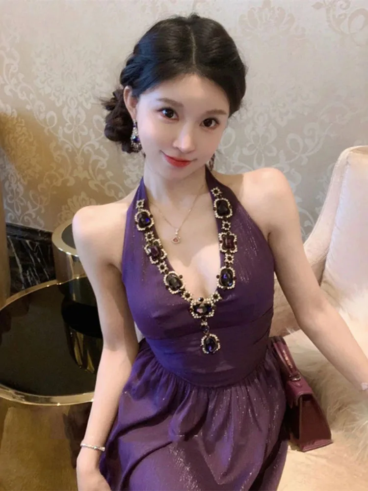 

Temperament light luxury hanging neck suspender dress women's spring high-end feeling stunning waist cinching long skirt