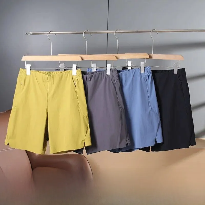 

Training Series Men's Running Fitness Shorts Quick Dry Woven Fabric Standard Fit Summer Collection Athletic Wear Male Model