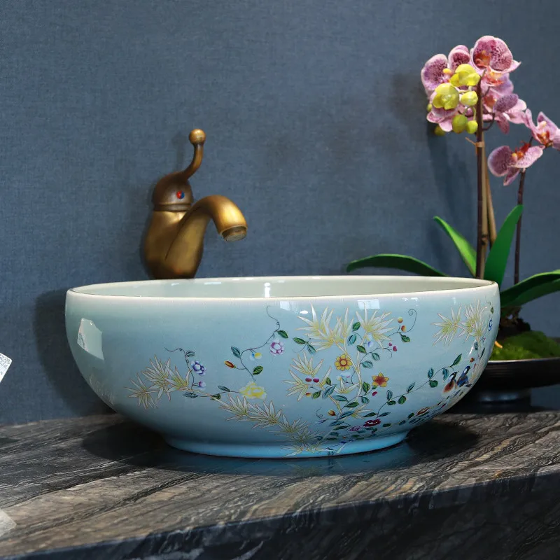 China Artistic Handmade flower bird Ceramic wash basin Lavobo Round Counter top painted porcelain wash basin blue bathroom basin