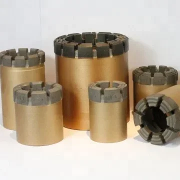 Impregnated diamond core drill bit, wire line core drill bit