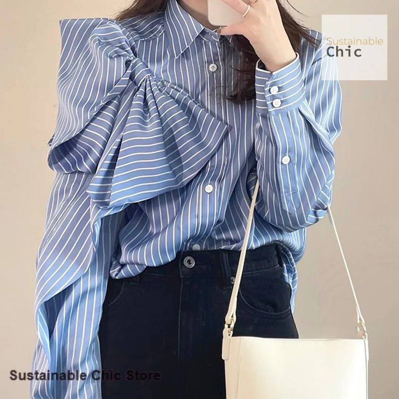 

Korean version of solid color bow wind blue striped shirt jacket female spring new temperament loose plus size casual Joker top.