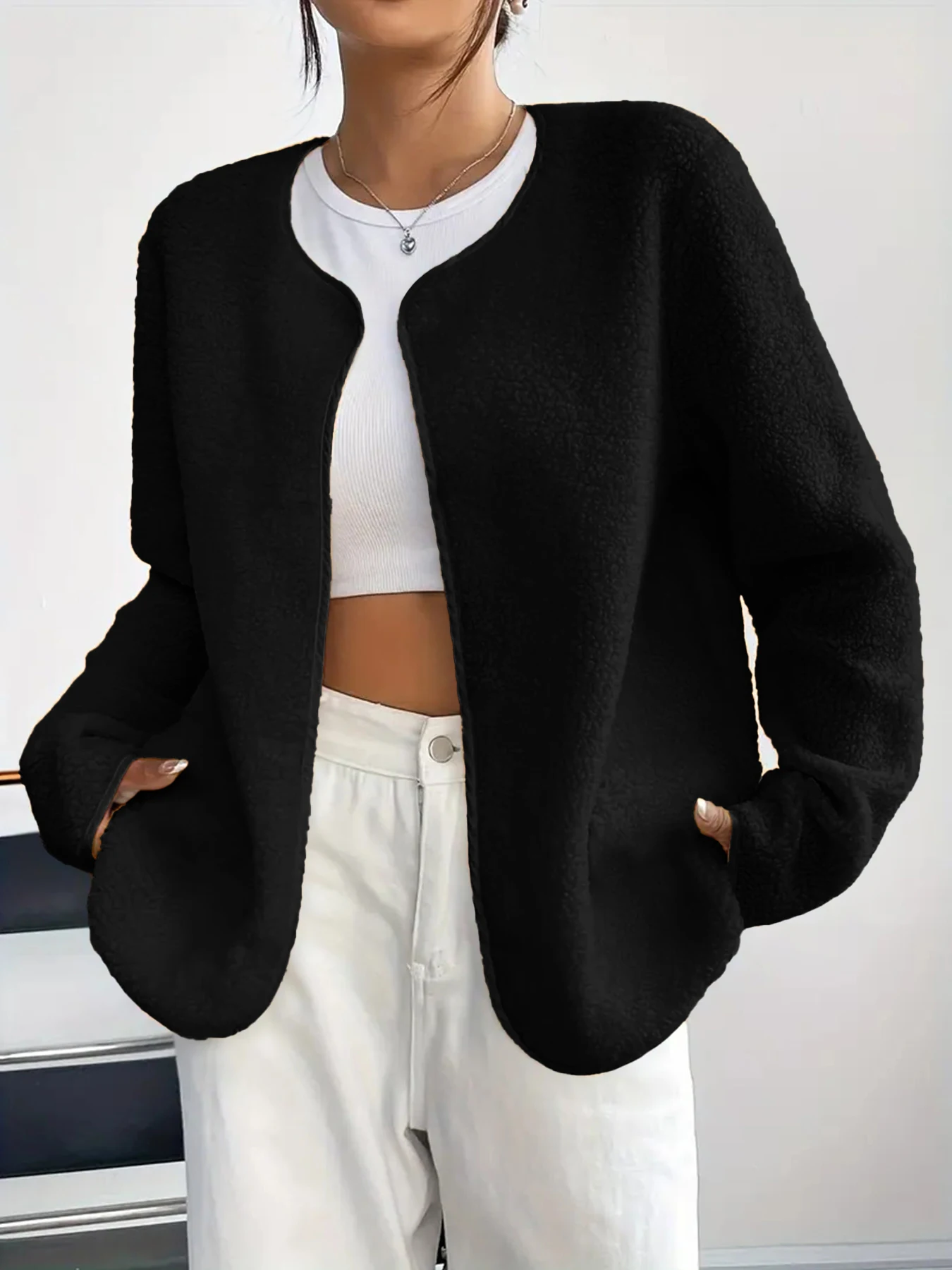 Herfst- en wintermode, eenvoudig en elegant temperament, effen pluche vest met ronde hals en lange mouwen