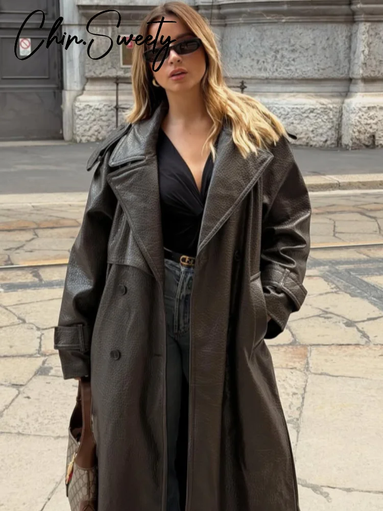 الشارع بولي Leather جلد المرأة معطف طويل موضة كم طويل زر حزام التلبيب جيب الإناث أبلى 2025 الخريف الشتاء سترة حريمي جديد