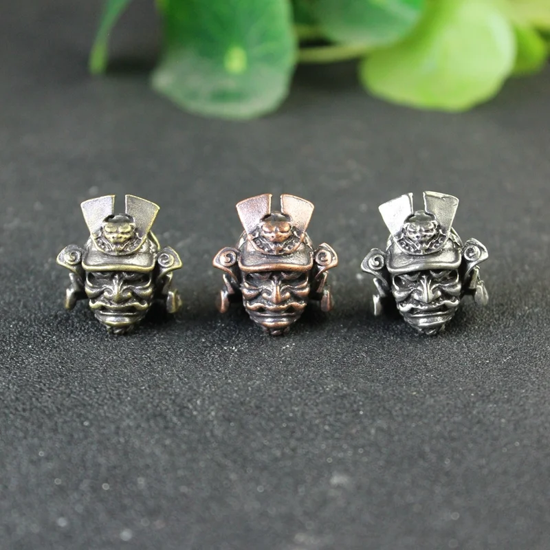 

Brass Japanese Samurai General Helmet Handmade Knife Beads Paracord Woven Rope Lanyard Pendants DIY Accessories Outdoor Tool EDC
