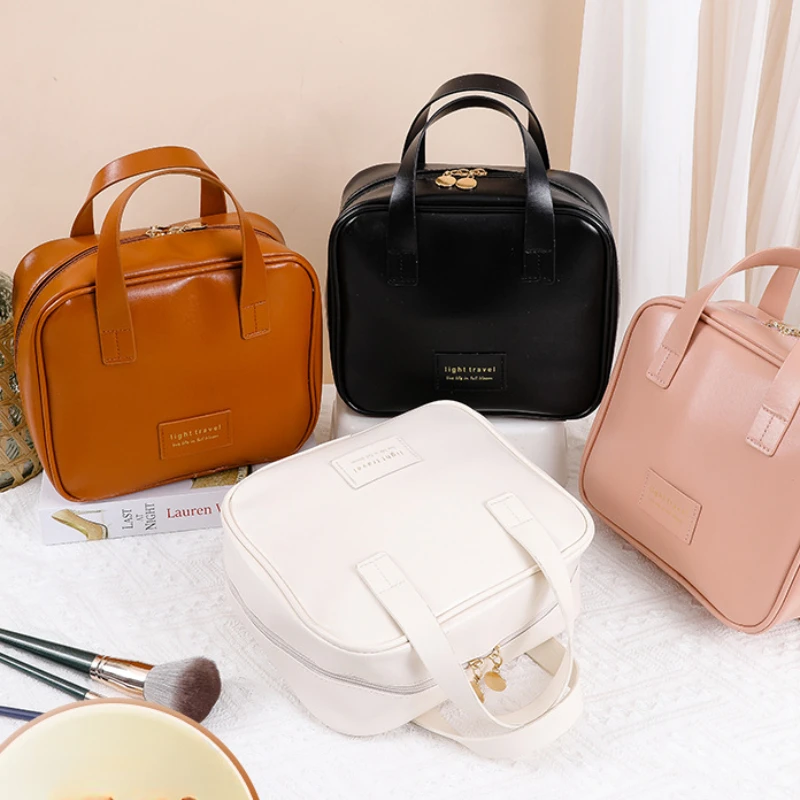 حقيبة مستحضرات تجميل نسائية جديدة سعة كبيرة حقيبة يد محمولة للسفر مقاومة للماء حقيبة تخزين للسفر والأعمال حقيبة تواليت متعددة الوظائف