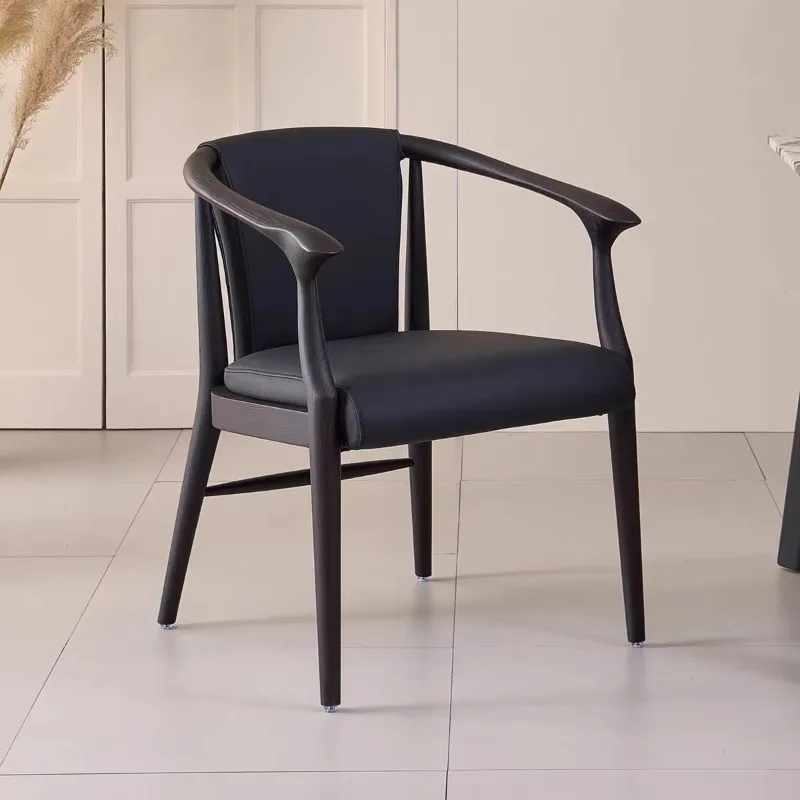 Upholstered dining chair with armrests Solid wood frame Interior furniture Family apartment Dining room Leather dining chair