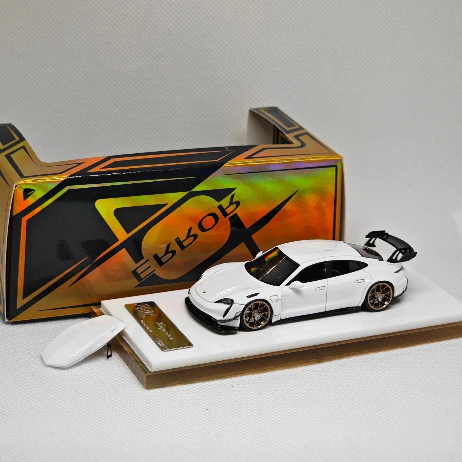

Taycan White 404 ERROR 1/64 #Err1/64Tay-White Resin Model Car Collection Limited Edition Hobby Toys