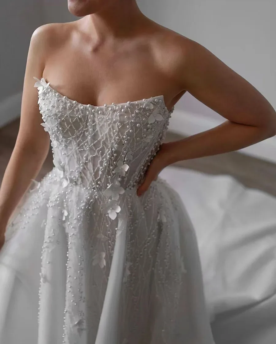 فساتين زفاف Flavinke فاخرة مخصصة على شكل حرف A بدون أكمام مزينة بالخرز واللؤلؤ وياقة مربعة وزهور رداء De Mariee