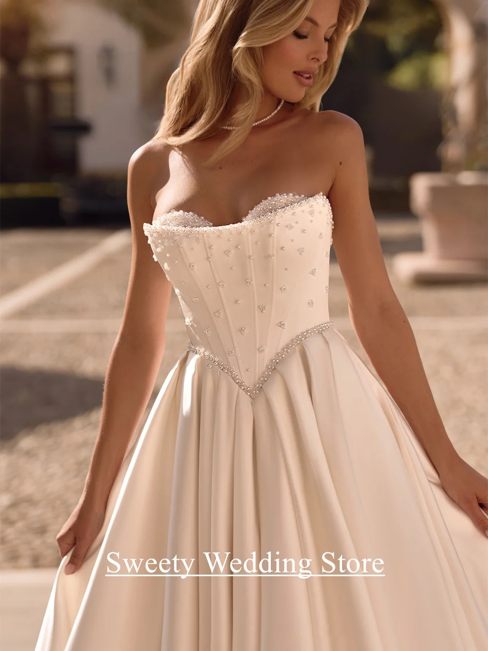 فستان زفاف مشد مخصص على شكل قلب بدون أكمام لؤلؤ سويب تراين بدون ظهر فيستدو نويفا المملكة العربية السعودية فستان زفاف