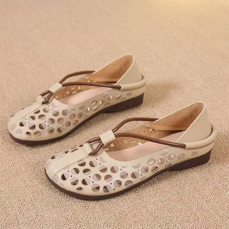 Women Leather Hollow Out Flat Sole Shoes Summer New Soft sole Non Slip Breathable Round Toe Slip On Shallow Retro Cave Sandals