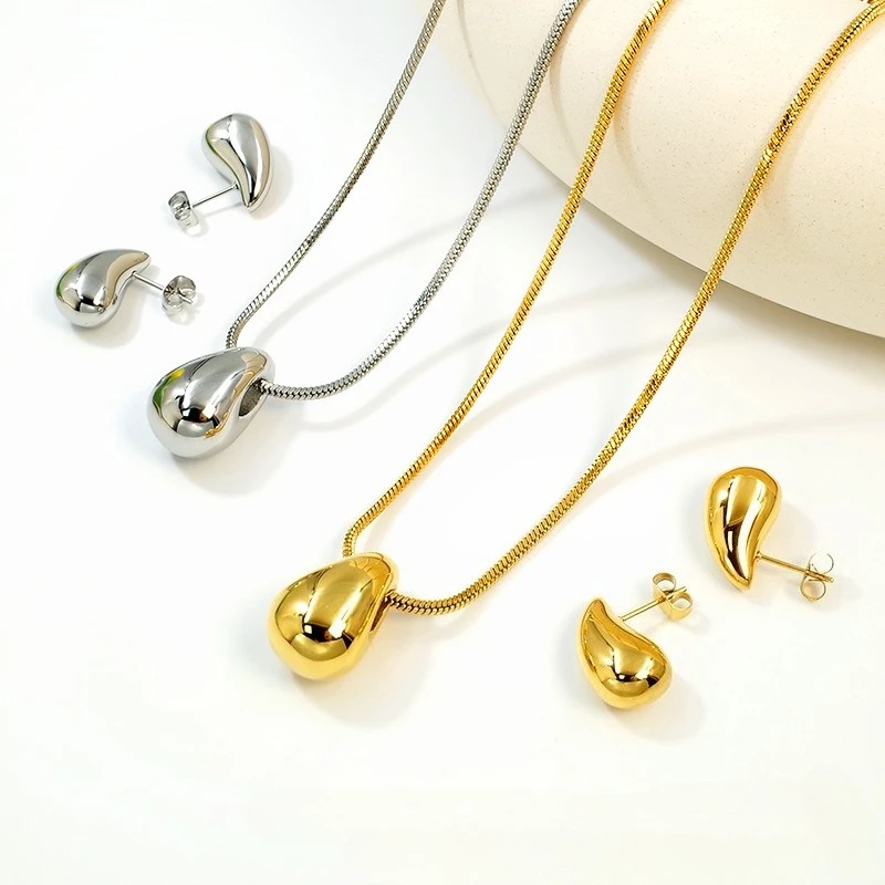 Conjunto de pendientes y collar con forma de gota de agua de acero inoxidable, colgante de acero de titanio pulido, chapado en coma de moda, exquisito de 18 quilates