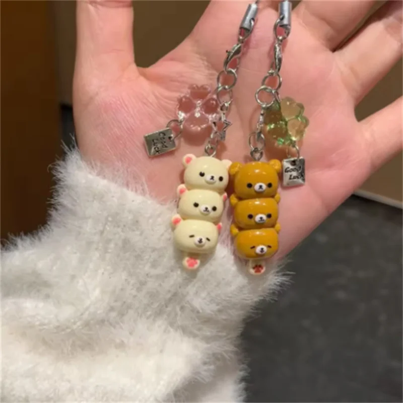 Kawaii الكرتون الدب لطيف فتاة على ظهره قلادة المفاتيح المبيعات الساخنة أنيمي الهاتف المفاتيح آيفون 17 بروماكس Airpods Ins كوريا جديد Y2K