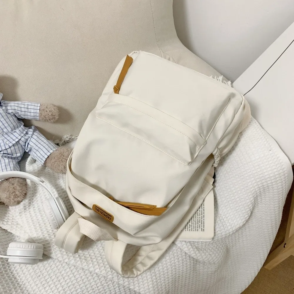 대용량 학교 배낭 단색 한국어 버전 대학생 책가방 심플한 스타일 지퍼 쇼핑 배낭