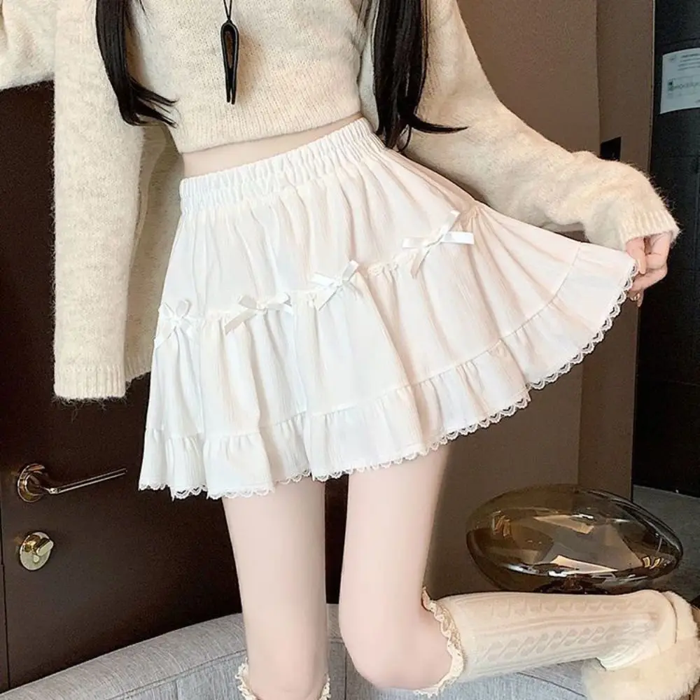 Cintura alta meninas curto mini saia solta com calças de segurança bowknot a linha saia bolo vestido plissado renda mini saias senhora