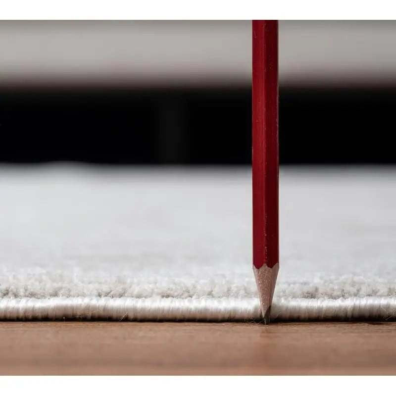 عاجي 5 أقدام 3 بوصة × 7 أقدام 3 في سجادة المنطقة