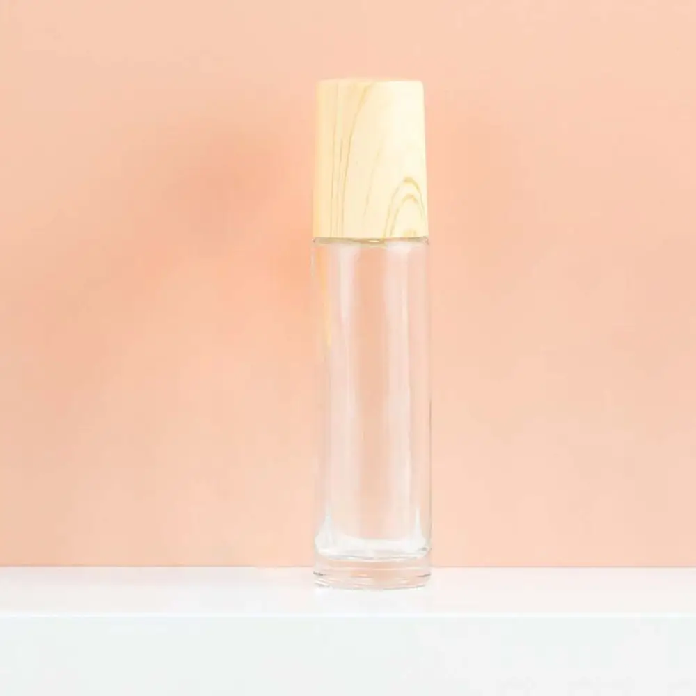 Botella vacía enrollable de 5/10ml, bola de acero, cubierta de grano de madera, cuentagotas de vidrio esmerilado, viales de aceite esencial, crema de aceite de Perfume
