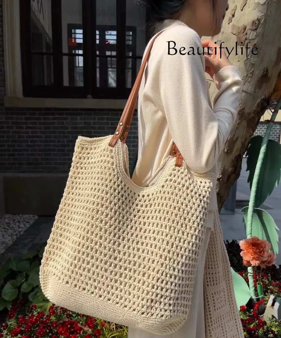 Spring and summer seaside vacation knitted woven hollow versatile shoulder bag large capacity underarm tote bag