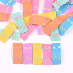 50Pcs Colorful Smile Embroidery Colth Labels Garment Washable Care Tags Sewing Accessories Crafts DIY Knitting Bag Shoe Supplies